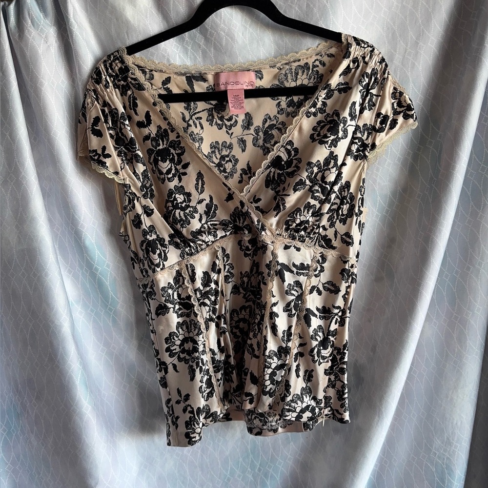 Bandolino Black and Cream Floral Blouse with lace trim.